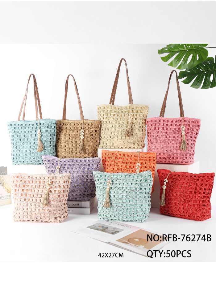 Bolso tote de rafia calada con borla y conchas