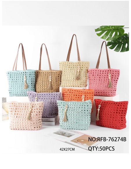 Bolso tote de rafia calada con borla y conchas