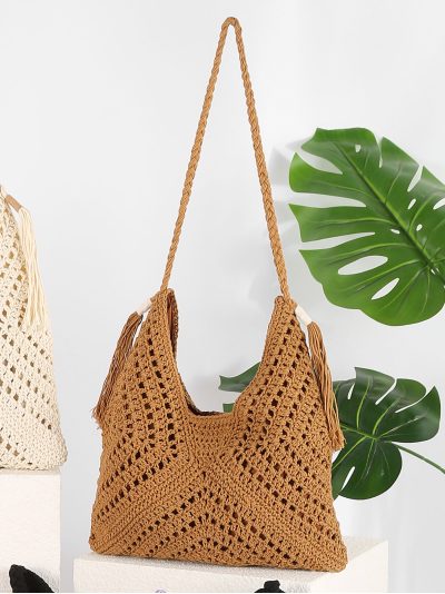 Bolso hobo de crochet con borlas laterales
