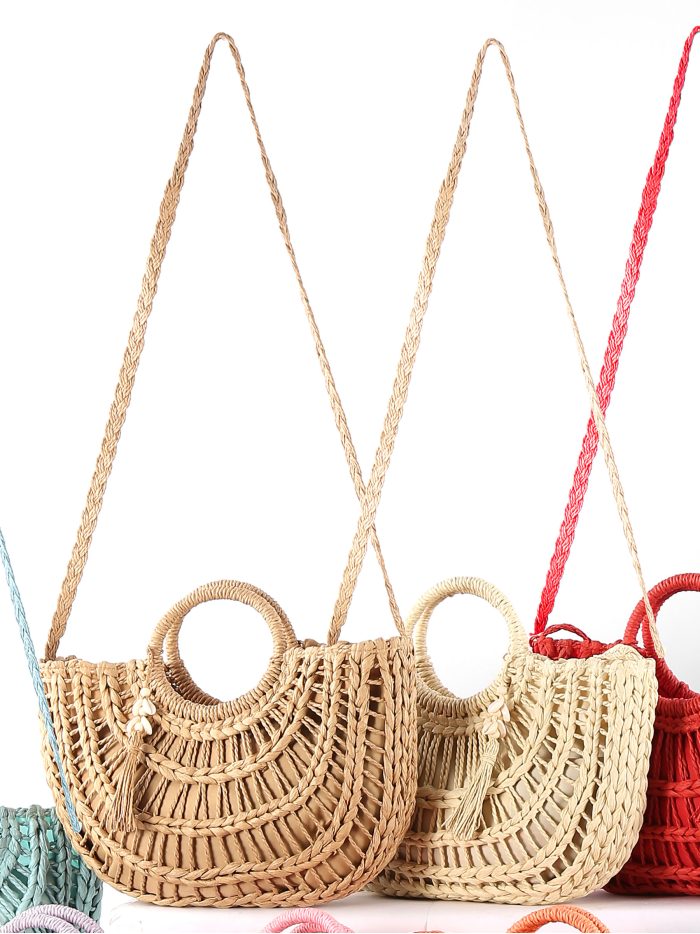Bolso de rafia semicircular con asa redonda