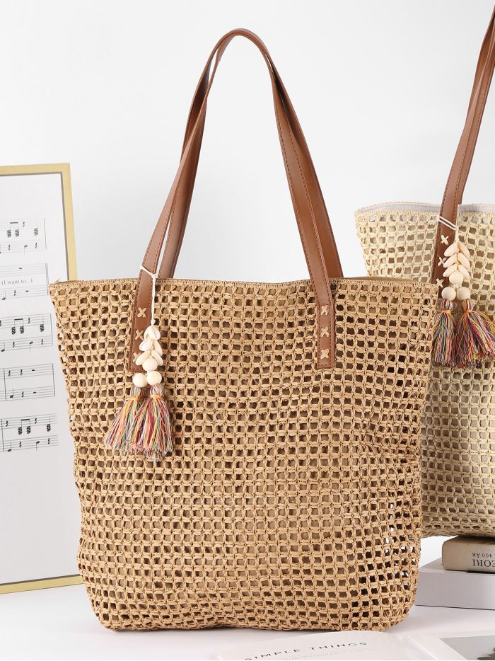 Bolso tote calado de rafia con colgante