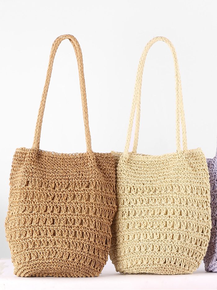 Borsa a tracolla traforata in rafia