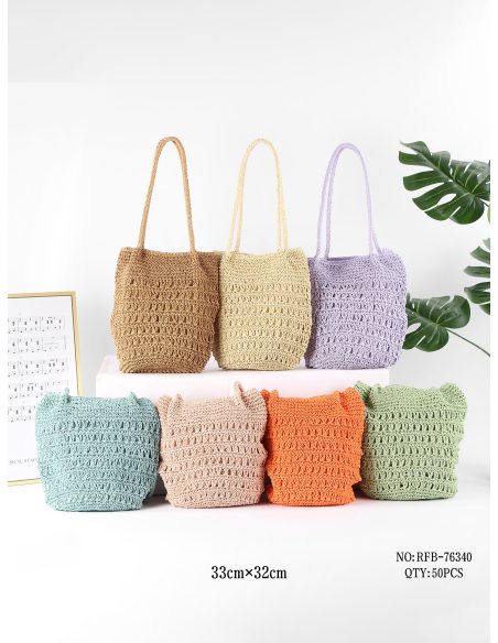 Borsa a tracolla traforata in rafia