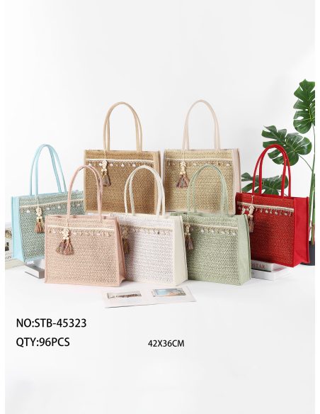 Sac cabas en raphia orné de coquillages et d'un pompon