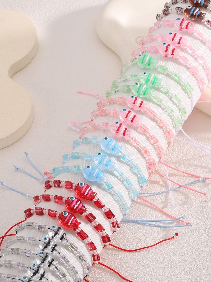 Pack 24 pulseiras ajustáveis peixe efeito cristal com expositor