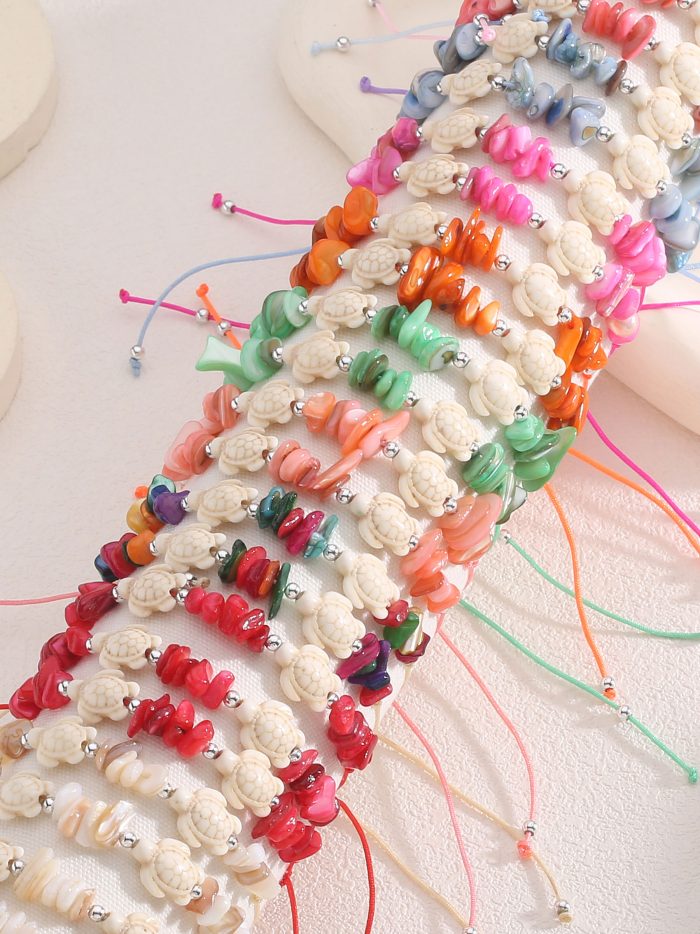 Set di 24 braccialetti regolabili tartaruga marina con espositore