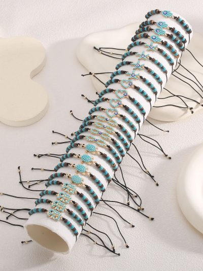 Pack 24 pulseras ajustables ojo turco con expositor