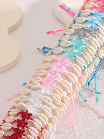 Pack 24 pulseras ajustables conchas y estrellas efecto cristal con expositor 2