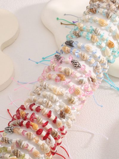 Pack 24 pulseras ajustables conchas efecto natural multicolor con expositor 2