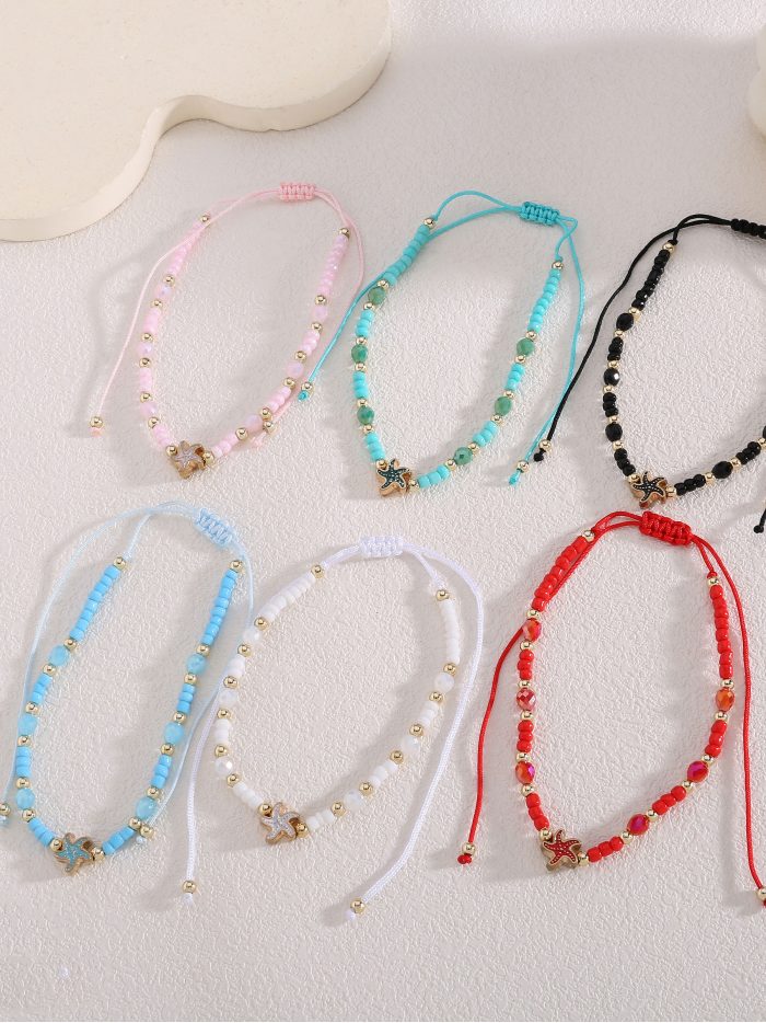 Pack 12 tobilleras ajustables estrella marina dorada