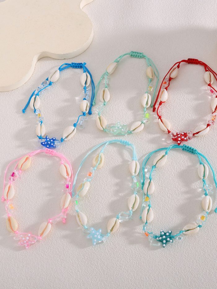 Pack 12 tornozeleiras ajustáveis conchas e estrela de resina