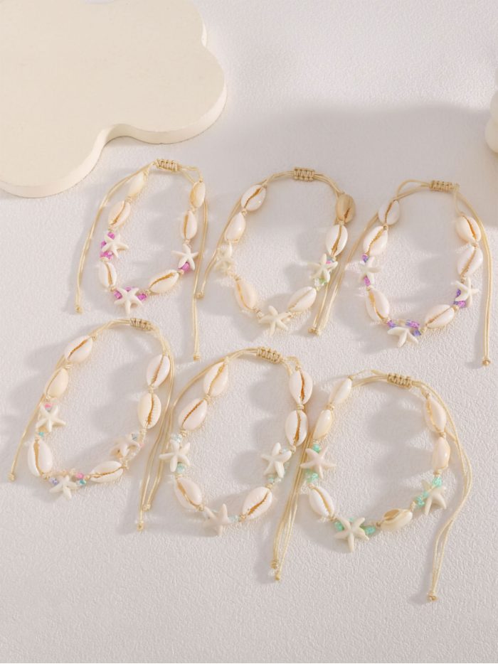 Pack 12 tobilleras ajustables conchas efecto naturales y estrella