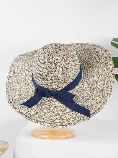 Sombrero de rafia ala ancha con lazo