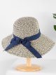 Cappello in rafia con fiocco
