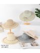 Cappello in rafia a tesa larga con conchiglie e bordo traforato