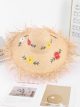 Sombrero de paja con flores bordadas y ala desflecada
