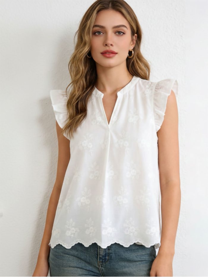 Blusa bordada sin mangas volante