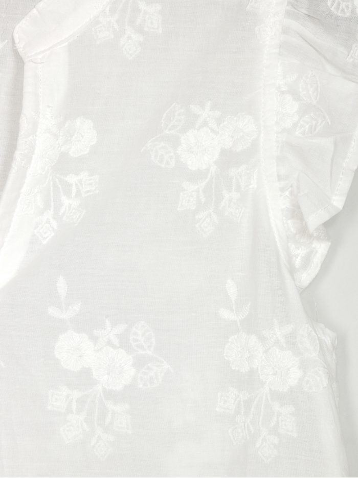 Blusa bordada sin mangas volante