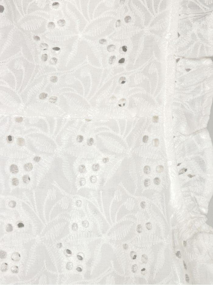 Top calado sin mangas volantes