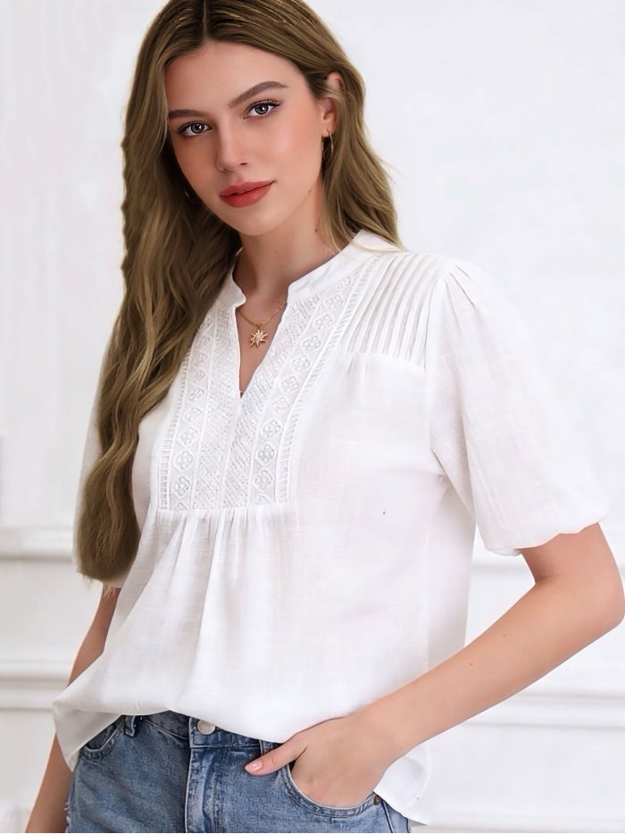 Blusa boho ricamata con maniche a sbuffo
