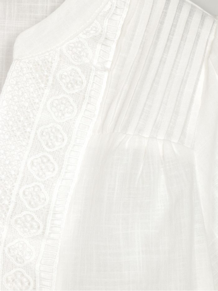 Blusa boho ricamata con maniche a sbuffo