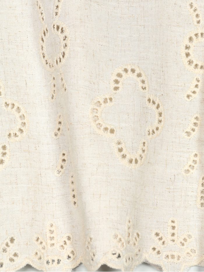 Top lino calado escote pico y volante