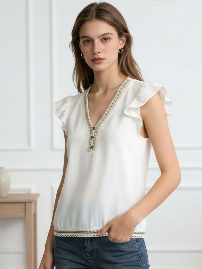 Top in lino con abbottonatura e volant