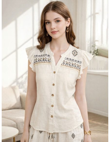 Camicetta in lino con volant ricamati
