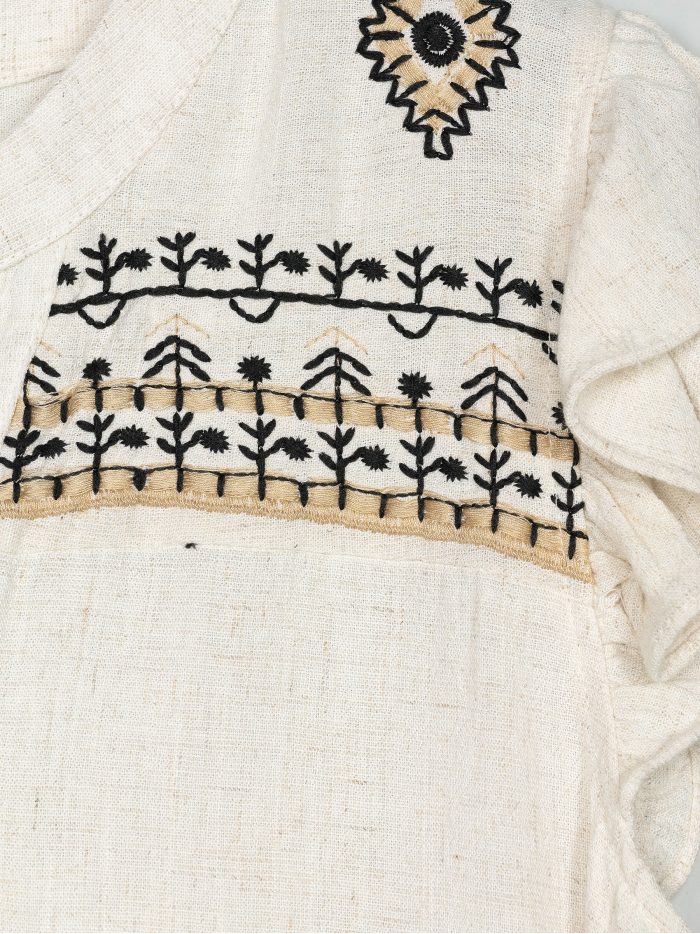 Camicetta in lino con volant ricamati