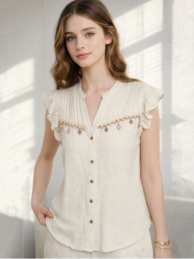 Blusa lino pliegues y detalle abalorios