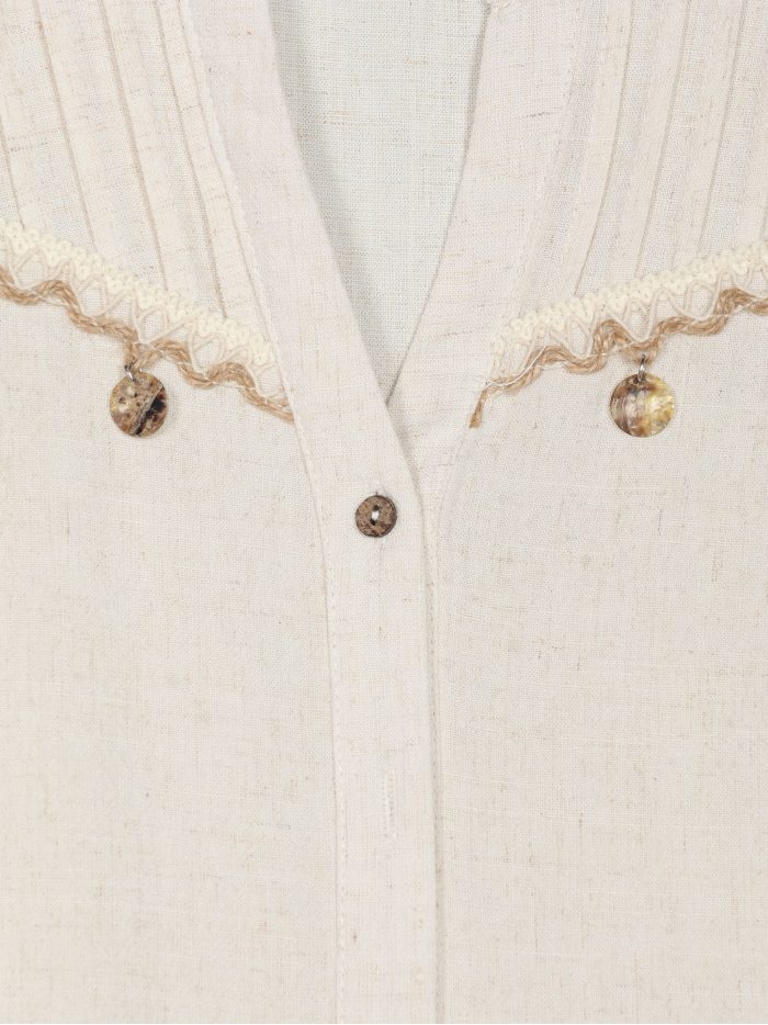 Blusa lino pliegues y detalle abalorios