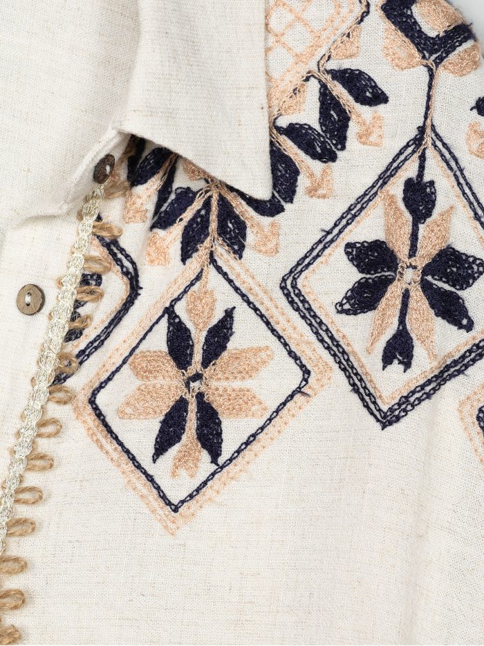 Blusa senza maniche in lino con ricami geometrici