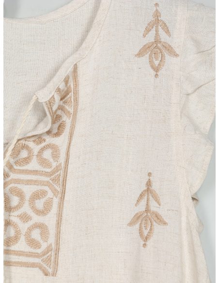 Blusa in lino con ricamo e fiocco con nappe