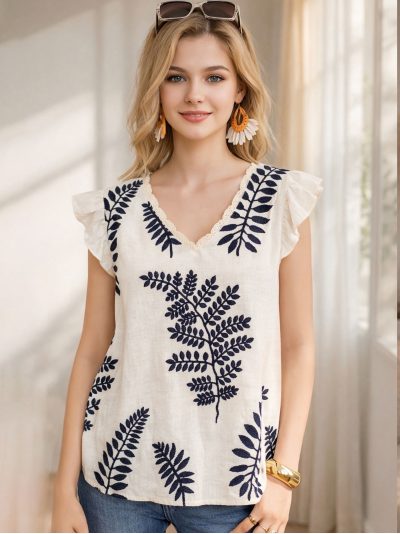Top lino bordado hojas escote pico