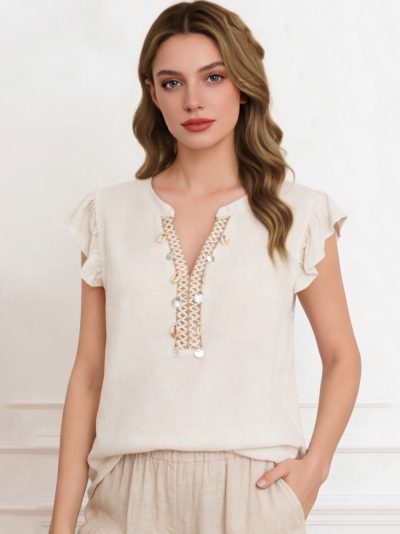 Blusa lino detalle conchas