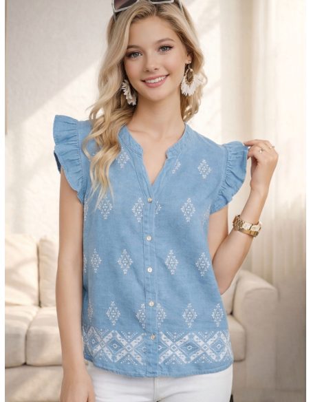 Blusa símil denim bordado y volantes