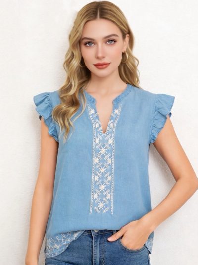 Blusa símil denim bordado y volantes