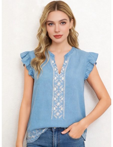 Blusa símil denim bordado y volantes