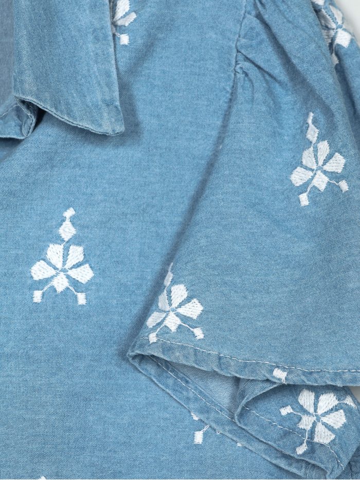 Camisa símil denim bordada cenefa y botones