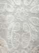 Sleeveless embroidered lace top with scalloped hem