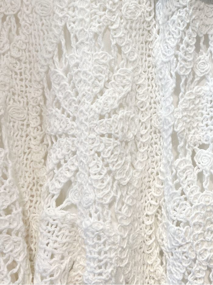 Pantalón flare de crochet calado