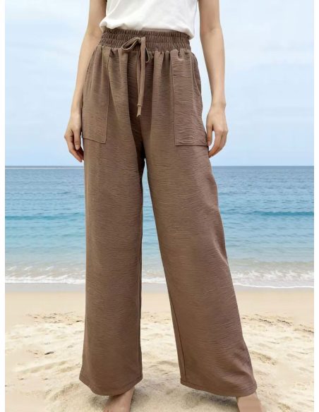 Pantaloni fluidi con tasche applicate