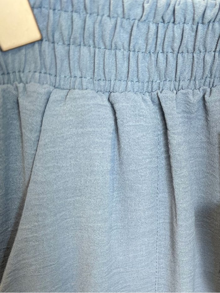 Pantaloni fluidi con tasche applicate