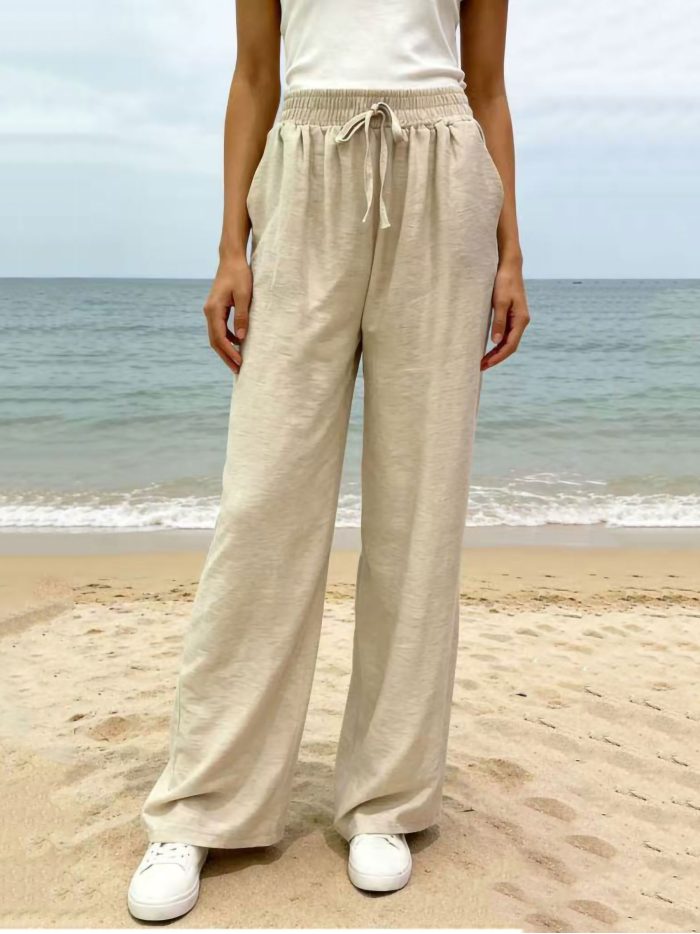 Pantalón fluido con bolsillos y cordón