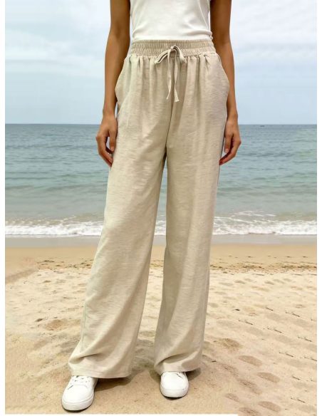 Pantalón fluido con bolsillos y cordón