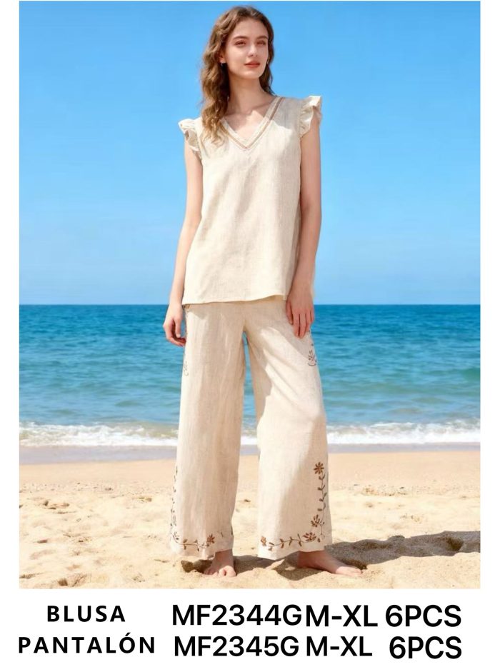 Blusa de linho com babado nos ombros.