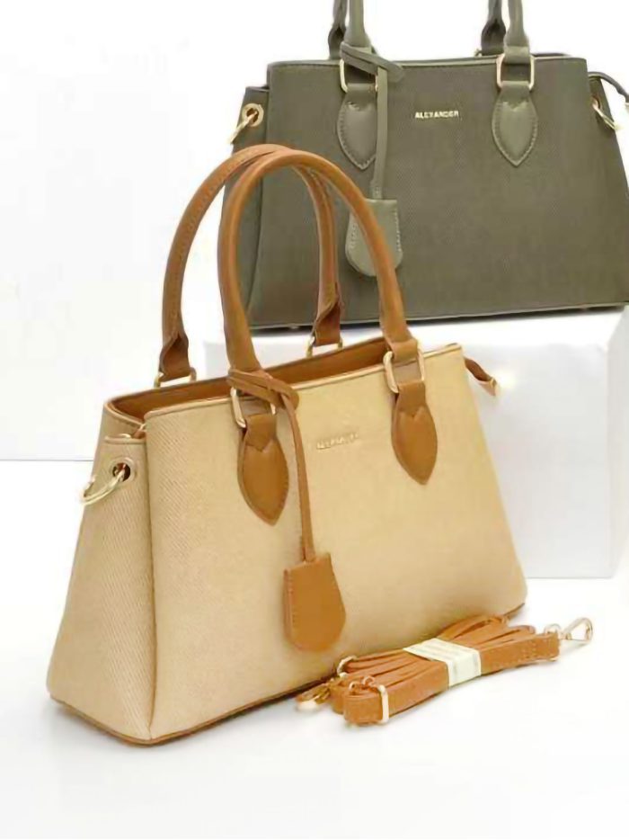 Bolso de mano combinado tipo satchel con colgante