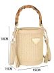 Bolso cubo de rafia con asa de efecto bambú