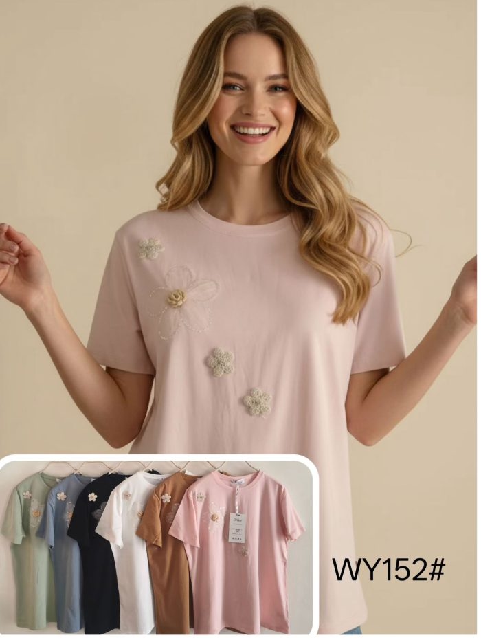 Camiseta amplia flores aplicadas