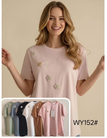 Camiseta amplia flores aplicadas